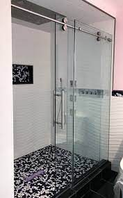 Top Rolling Barndoor Style Door And Stationary Panel Features 3 8 Glass And Stainless Steel Hardwa Shower Barn Door Glass Shower Enclosures Shower Enclosure