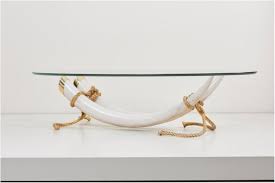 Receive the latest inspiration and advice. Monumental Faux Elephant Tusk Coffee Table Attributed To Maison Jansen