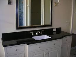 Bathroom Black And White Granite Countertops Glam Bathroom Design With Classic Cream Walls And Gorgeous Black Beveled Mirror F Absolute Black Granite Countertops Black Granite Countertops Granite Bathroom