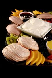 Lots of fruit, coconut, chocolate and fresh mint! Pavlova Dessert Charcuterie Board Celebration Generation