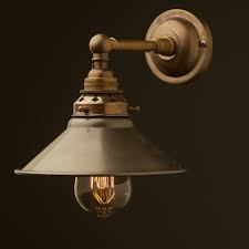 The nimbus glass wall sconce features white cloud glass with polished steel accents. Antique Brass Straight Arm Wall Sconce Shade