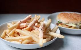 In a medium bowl, combine the mayonnaise, ketchup, relish, sugar and vinegar and stir until well incorporated. How To Make In N Out Sauce Taste Of Home