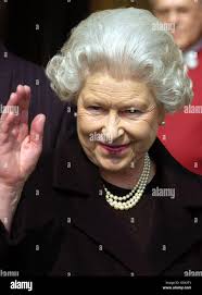 Queen waves to crowds at Windsor Stock Photo