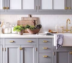 Dove Grey And Brass Handles Kitchen Cabinets Grey And White Small Kitchen Solutions Kitchen Cabinets