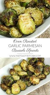 Tossed in just a bit of olive oil, pork panko bread crumbs, and parmesan cheese, air fryer brussel sprouts are absolutely delicious! Oven Roasted Garlic Parmesan Brussels Sprouts By The Toasty Kitchen Healthy Vegetable Recipes Sprout Recipes Side Dish Recipes