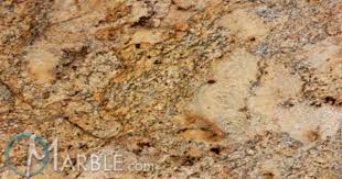 Tan brown is a traditional dark granite with flecks of caramel, green, and blue. Cloudy Yellow Granite Brazil Granite Granite Colors Cloudy