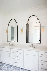Matte Black And Gold Bathroom Accessories Think Out Of The Box When Mixing Metal Finishes In Your Bathroom Eclectic Bathroom Design Eclectic Bathroom Round Mirror Bathroom