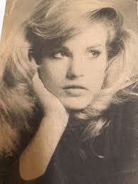 a lady in red who writes