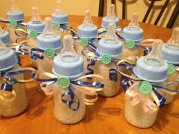 From gifts that pamper your guests, like lip balm and body scrub, to ones that taste great, like doughnuts and candy, these baby shower favors are ones. Baby Bottles Ribbon And Buttons From Dollar Store Filled With Bath Salt For Boy Baby Shower Fav Baby Boy Shower Favors Baby Shower Diy Trendy Baby Shower Ideas