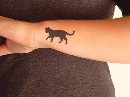 60 Inspiring Cat Tattoos Designs And Ideas For Cat Lovers Cat Silhouette Tattoos Cute Cat Tattoo Black Cat Tattoos