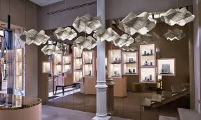 The gentle aqua color palette blends beautifully into a beach house or coastal style space. Swirl Lzf Lamps