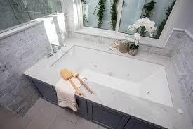 One of the most common tubs, an alcove tub, sits at the end of a small bathroom width wise, flanked by three walls. Bathtub Dimensions Size Guide Designing Idea