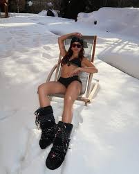 Anitta Is Ready for Anything in a swimsuit and Snow Boots