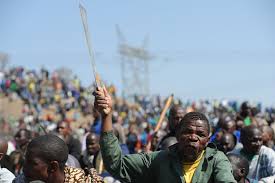 Report blames everyone but the government. Pictures Remembering Marikana Massacre 7 Years On