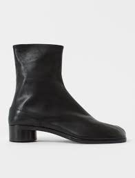 Join to listen to great radio shows, dj mix sets and podcasts. Maison Margiela Low Heel Tabi Boot In Black Voo Store Berlin Worldwide Shipping
