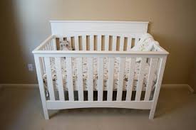 Top rails of crib sides should be at least 26 inches above the top of the mattress support when the mattress support is in its lowest position. How To Easily Assemble A Baby Crib With Video Amanda Seghetti
