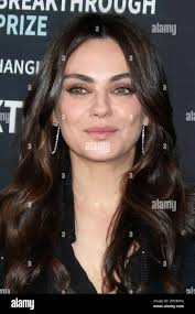 Mila kunis red carpet event hi-res stock photography and images