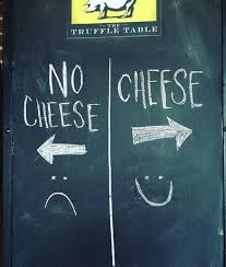 Cheese Puns Overflow Onto The Sidewalk At The Truffle Table Cheese Puns Truffles Cheese