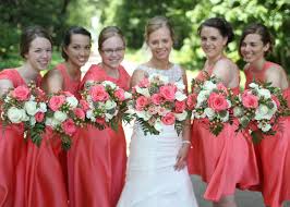 Peach coral and off wedding bouquets. Pantone Coral Wedding Trend Color Fancy Florals By Nancy