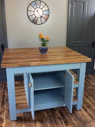 This long breakfast bar island is a perfect stage to show off that new recipe. Freestanding Kitchen Island With Breakfast Bar Cupboard