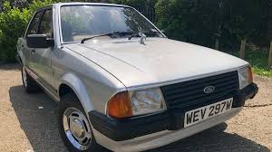 Standard on all zx2s are foglamps, a cassette player and a rear spoiler. Princess Diana S 1981 Ford Escort Goes For Auction