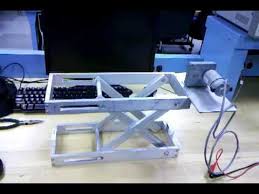 This Was An Initial Prototype To Develop A Scissor Lift Mechanism It Is Based Off Of The Design Located Here Http Www Engine Scissor Lift Lift Table Design