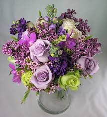 Purple Floral Centerpiece Reminds Me Of My Mother The Lavender Rose Sterling Silver Was Her Favorite Purple Wedding Flowers Wedding Flowers Lilac Bouquet