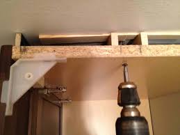 Due to the floor being concrete under the ceramic tile there is a natural slant, or unevenness to the floor. How To Replace And Install A Bathroom Vanity And Sink