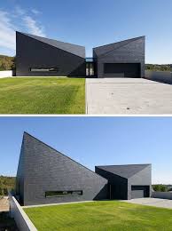 14 Examples Of Modern Houses With Black Exteriors Roof Architecture Brick Architecture Modern Architecture House