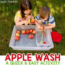 Focusing on kids activities perfect for toddlers and preschoolers. Apple Washing Bin Sensory Activity Busy Toddler