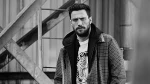 Wearing a grimy grey sweatshirt. How Does Mr Aaron Taylor Johnson Do It The Journal Mr Porter