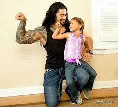 I slid my phone out of my pocket and unlocked it. Wwe Super Star Roman Reigns Latest Hd Photos Gym Images Childhood Pictures Wwe Superstar Roman Reigns Roman Reigns Daughter Roman Reigns Family