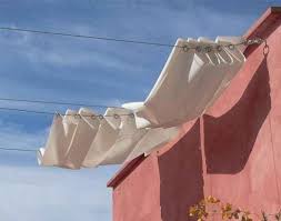 Use An Ikea Curtain System As An Impromptu Shade During The Summer Easy Backyard Diy Easy Backyard Diy Backyard