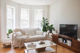 A smaller piece, like a loveseat instead of a sofa, will fit the room better and, in turn, make the space feel larger. 10 Simple Decorating Rules For Arranging Furniture