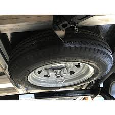 There is no place available to store an unmounted spare tire. Spare Tire Kit Sylvansport