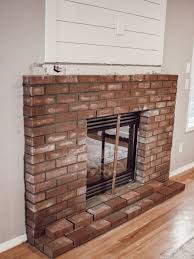 A real brick or stone fire surround needs to be removed brick by brick (or stone by stone). How To Build A Diy Brick Fireplace Hearth With A Shiplap Accent Wall Rustic Wood Beam Mantle Rain And Pine