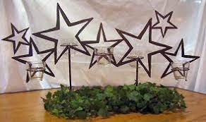Table decorations ideas will always feature yummylicious cupcakes and cookies as these look cute. Star Centerpieces Star Centerpiece Ideas Group Picture Image By Tag Keywordpictures Star Centerpieces Star Decorations Centerpieces Without Flowers