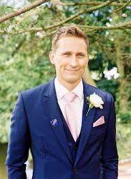 The best wedding suit color is blue as it highlights the groom as a shining star and makes him the center of attraction. Navy Blue Suit Wedding No Tie Novocom Top