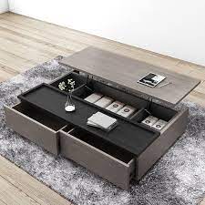 Low built coffee tables are famous these days being the center pieces of your living room decor. Modern Lift Top Wood Storage Coffee Table Gray And Black Rectangular Coffee Table With Drawers In 2021 Coffee Table With Drawers Coffee Table Grey Coffee Table Wood