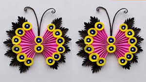 Today we are showing you a step by step tutorial on how to make an adorable paper flower wall hanging craft.#diy #wallhanging #walldecoron trending wall han. Paper Flower Wall Hanging Wall Decoration Idea Simple Butterfly Wa Paper Flower Decor Paper Flowers Craft Wall Hanging Crafts
