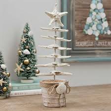 Check out our seashell christmas tree selection for the very best in unique or custom, handmade pieces from our ornaments & accents shops. Seashell Christmas Tree With Starfish Topper Kirklands