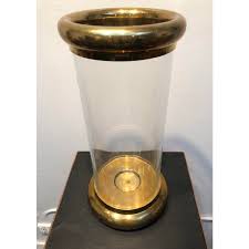 Just add a pillar candle and let the candlelight transform your house into a cozy home. 1980s Vintage Chapman Brass And Glass Hurricane Candle Holder Chairish