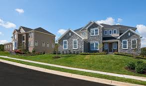 Stately elevations, hardwood or ridged core flooring on the entire main living level, infinity islands with quartz countertops, pendant lighting, tile backsplashes with hidden outlets, nest learning thermostats. Aldie Estates Aldie Va