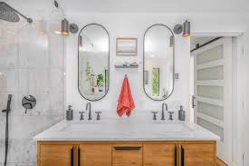 Floating round a mirror by casamidy hangs above a duravit sink in a bathroom in this parisian rooftop apartment. Sizing And Lighting A Mirror Around A Vanity Furniture Lighting Decor