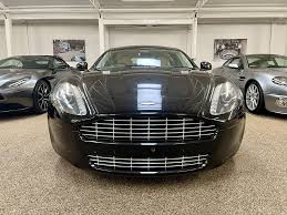 Image result for Jet Black 2011 Aston Martin