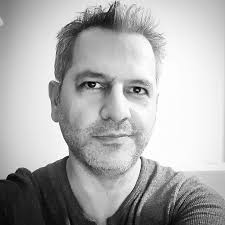 In March 1972, the World Trade Center towers were nearing completion,  standing as symbols of modern engineering and architectural prowess in New  York City. These iconic skyscrapers, designed by Minoru Yamasaki, featured