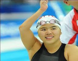 Singapore swimmer yip pin xiu raises her arm after winning gold in the women's 100m backstroke final at the 2020 tokyo paralympics. Gold For Breakfast Yip Pin Xiu Breaks World Record