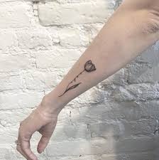 Dainty Black And Grey Flower Tattoo Tulip Tattoo Tattoos Tattoo Spots
