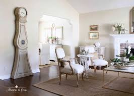 Play with crisp whites and airy materials for elevated elegance within a country rustic interior. French Country Living Rooms