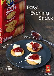 Strawberry Jam And Brie Are A Match Made For Summer Evenings With Friends Top An Original Ritz Cracker With A Slice Of Brie Ch Snacks Easy Evening Snacks Food
